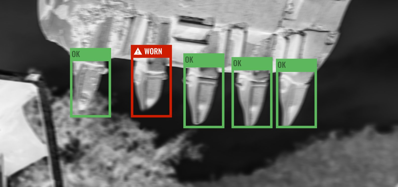 A close-up of excavator bucket teeth, with bounding boxes indicating which teeth are OK and a warning that one of the teeth is worn